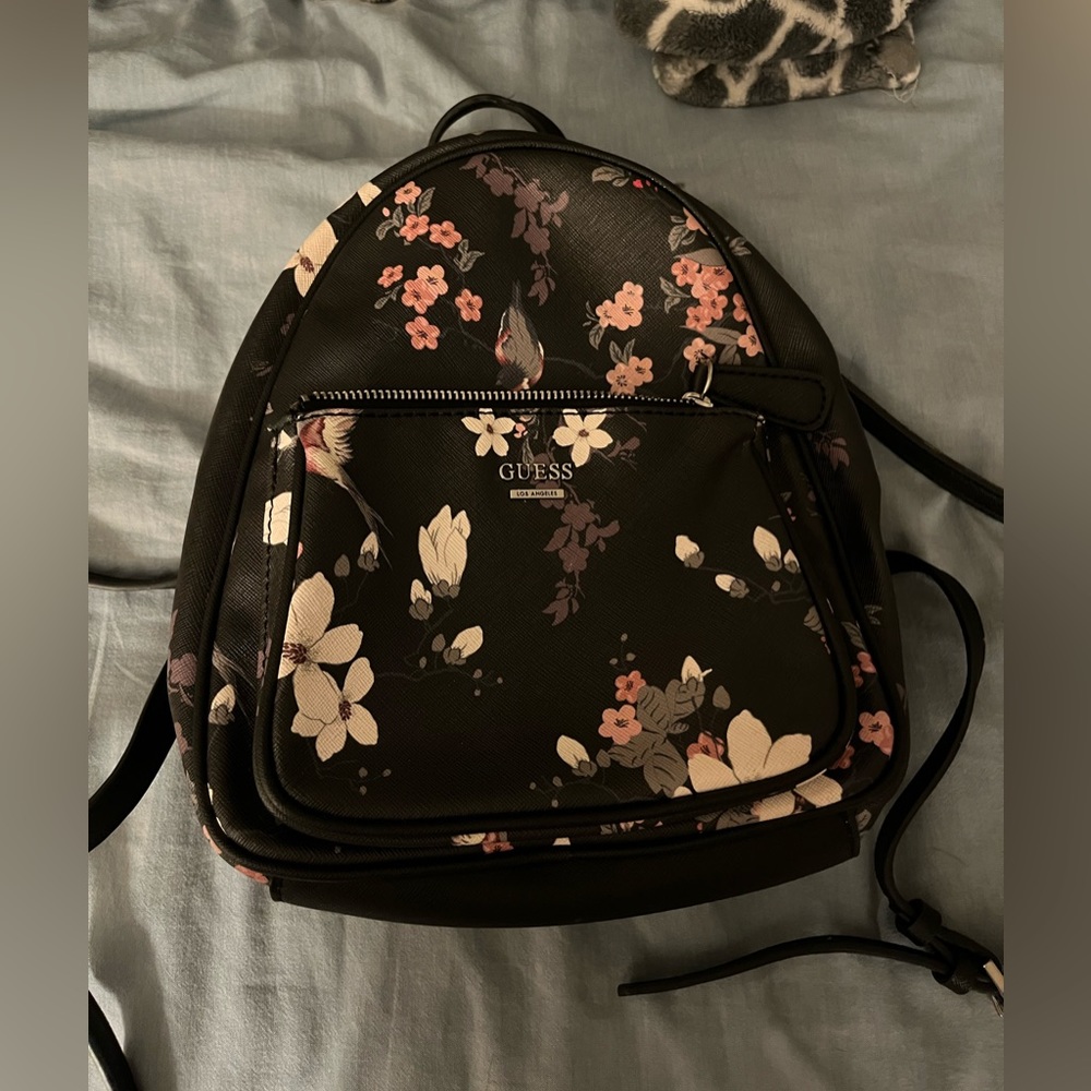 Black Guess backpack with birds and cherry blossoms